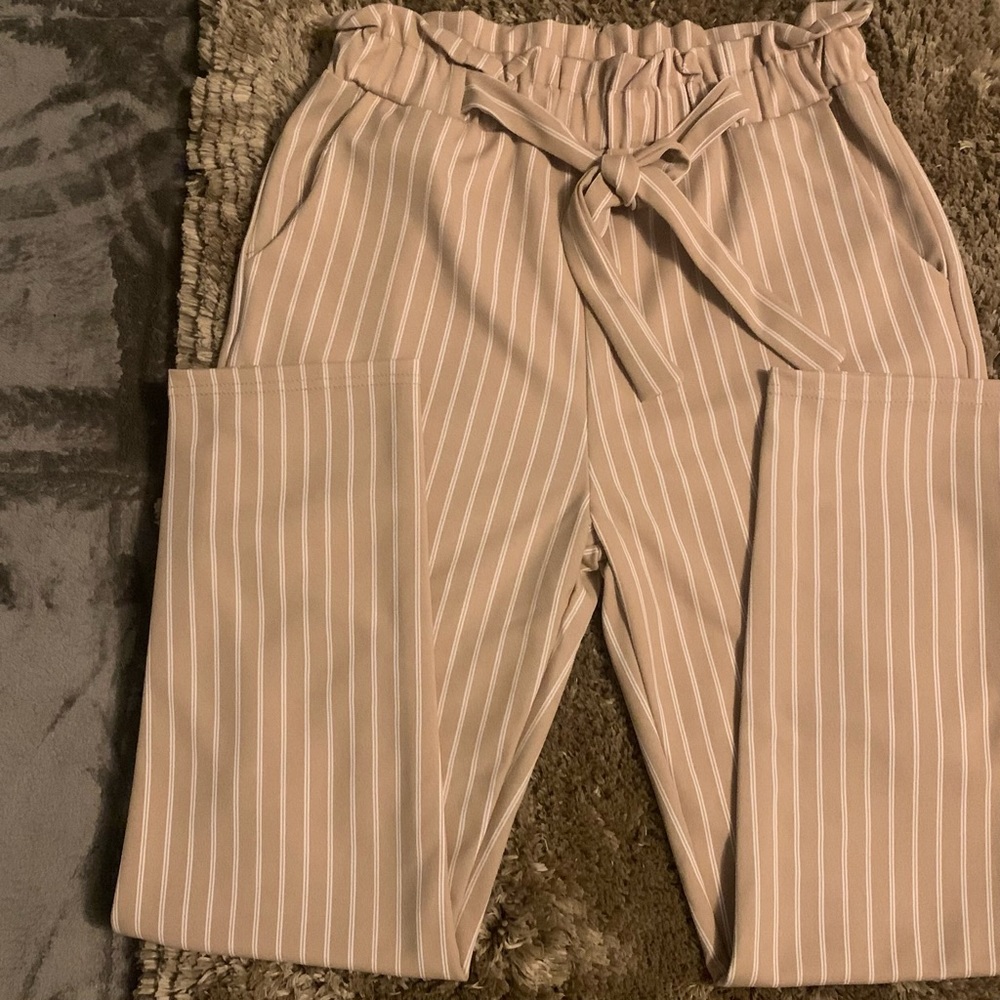 Pantalón formal poco entubado.Nuevo,sin usar.